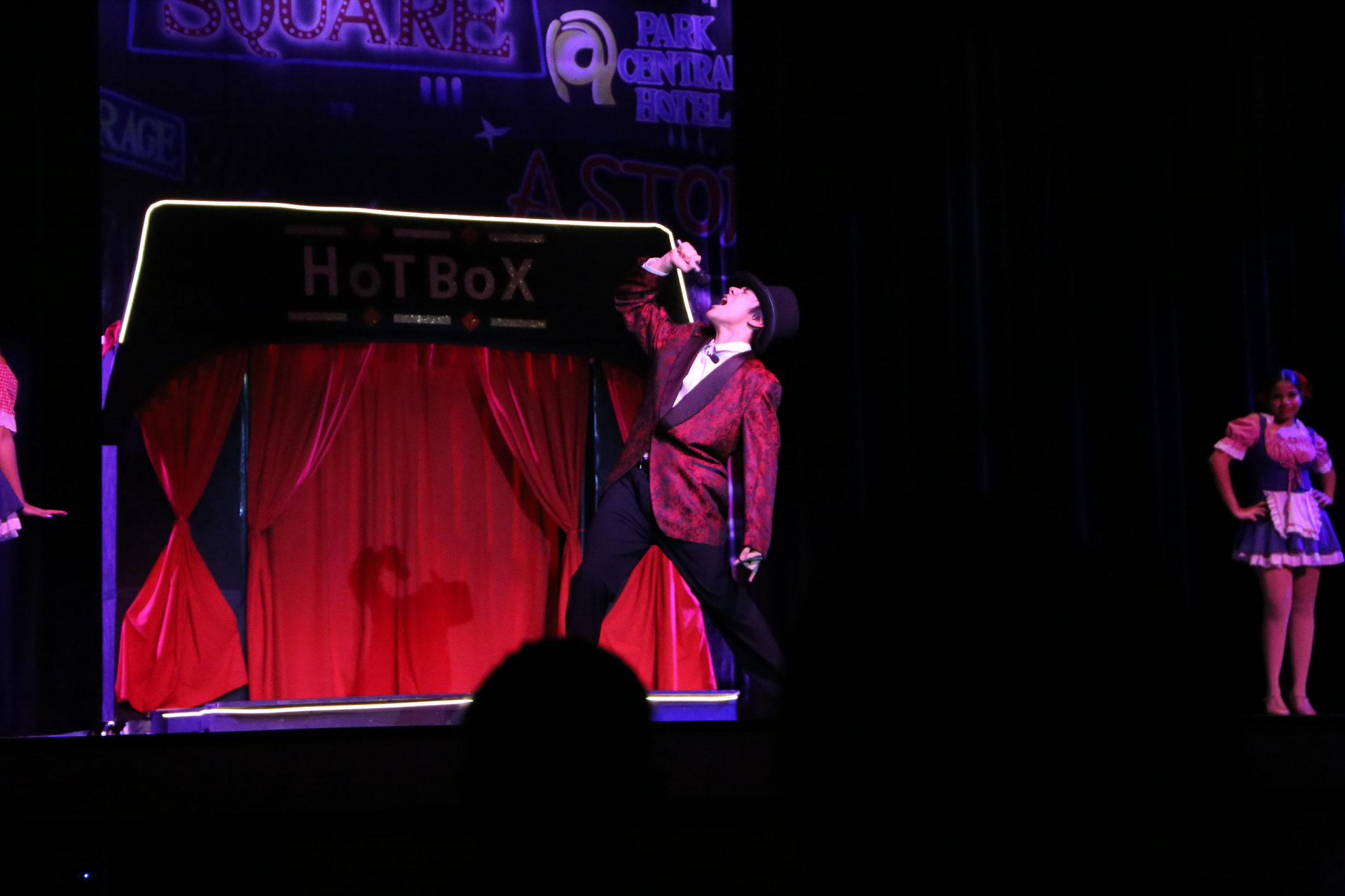 Singing in front of the Hot Box stage